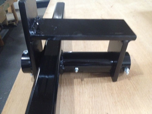 Closeup view of walking beam assembly
